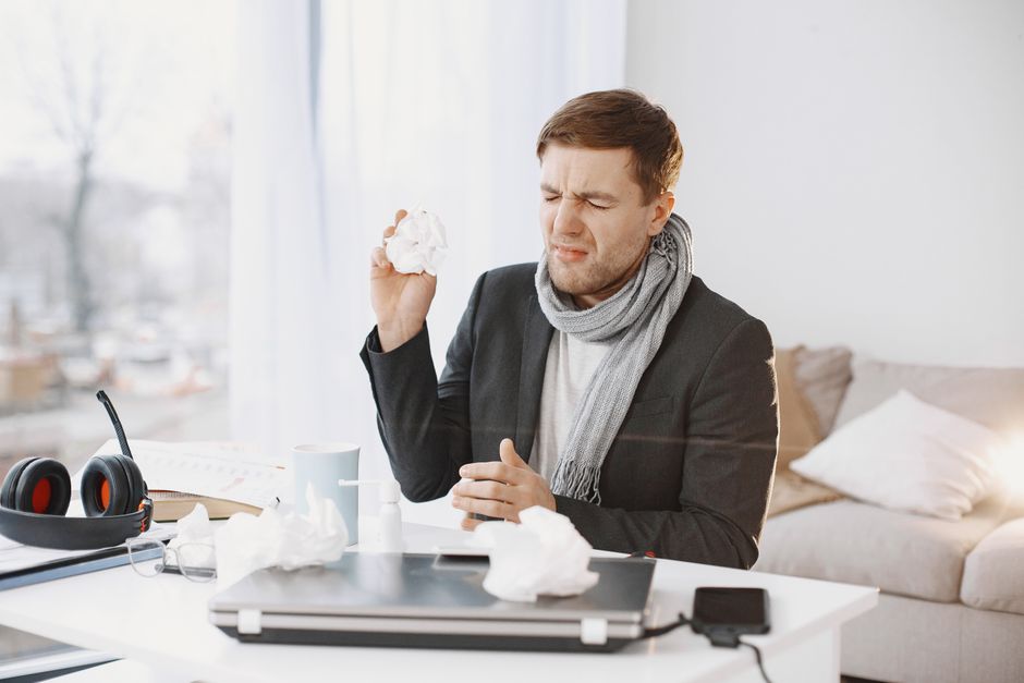 person sneezing outdoor allergy telehealth care
